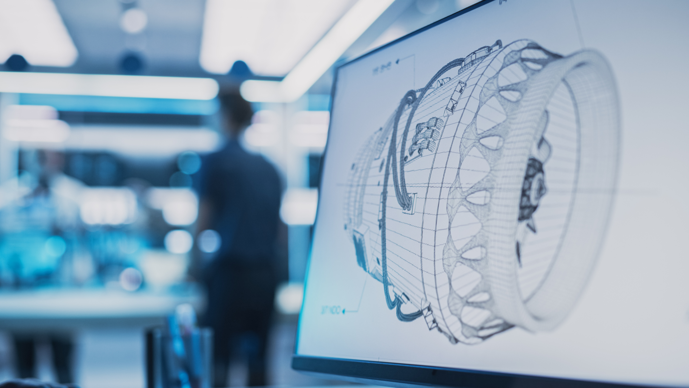 Close Up of a Computer Monitor Display with 3D CAD Software with Prototype Turbine Motor Project. Interface with Vital Setting and Programming Options for the Industrial Engine Prototype.